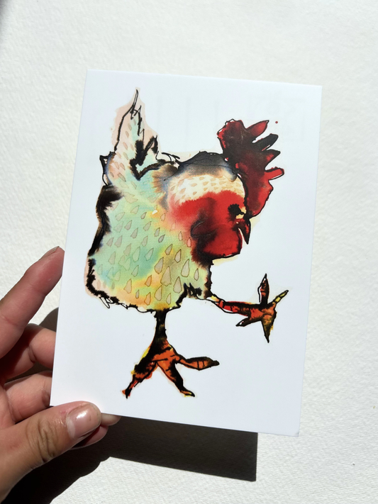  A6 postcard featuring a hand draw vivid watercolour illustration of a cartoon Cockerel.
