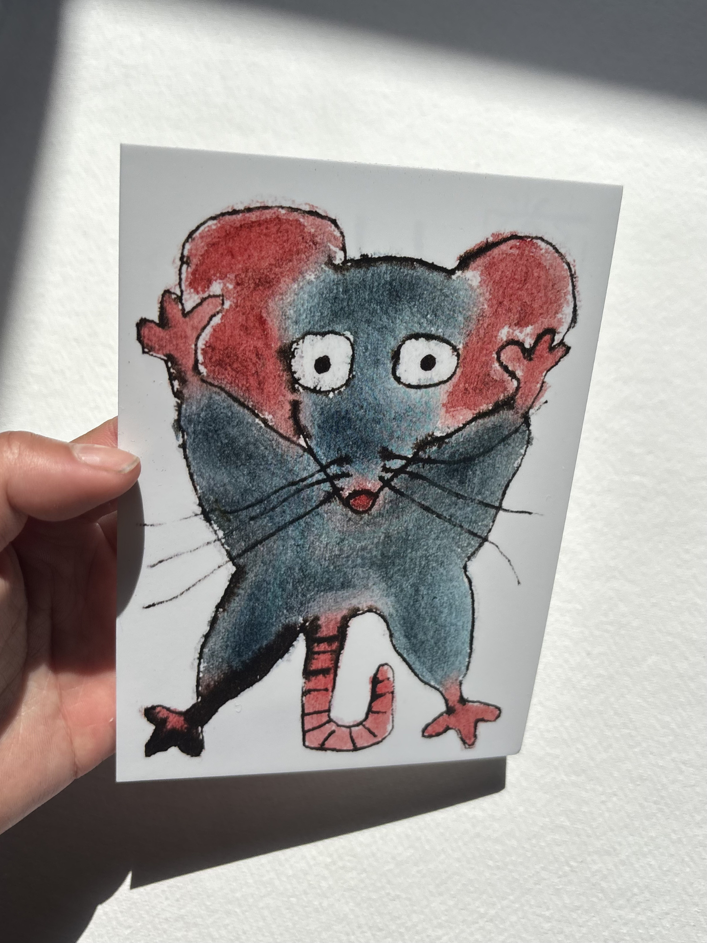 A6 postcard featuring a hand draw vivid watercolour illustration of a cartoon mouse.