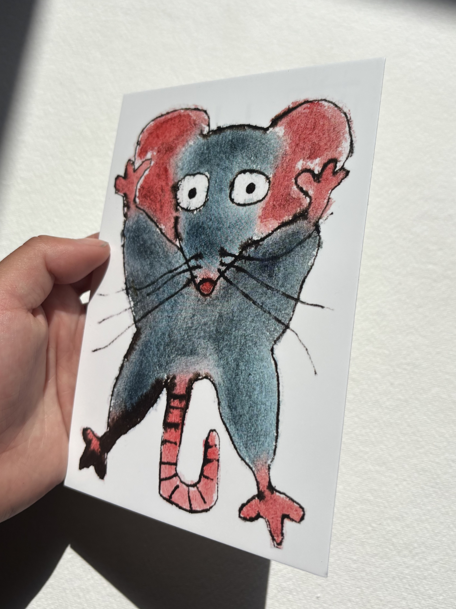 A6 postcard featuring a hand draw vivid watercolour illustration of a cartoon mouse.